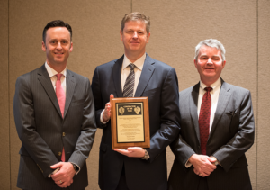 Tom Burke (middle), President and CEO of Rowan Companies, received the 2017 IADC Contractor of the Year award from IADC President Jason McFarland (left) and Clay Williams, President and CEO of National Oilwell Varco, at the 2017 IADC Annual General Meeting in Austin, Texas, on 10 November