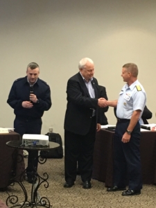 Alan Spackman, Advisor, IADC, is recognized by the National Offshore Safety Committee and the Coast Guard for his years of service. From Left: Captain Scott Kelly, Chief of the Environmental Standards Division from GCHQ; Alan Spackman; Admiral Paul Thomas, Commander of the 8th Coast Guard District. 