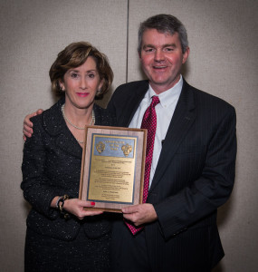 Julie Robertson of Noble Corp accepts the 2013 IADC Contractor of the Year award from Clay Williams with award sponsor NOV at the 2013 IADC Annual General Meeting in San Antonio, Texas.